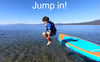 cute boy jumps into the water from his waterkids stingray inflatable paddle board sup for kids and groms
