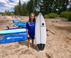 Team rider for waterkids surfboard holding his 5ft kids surfboard made for high performance wave riding and catching tubes and barrels