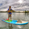 Young bor sup fishing from his Waterkids Tahoe SUP for youth size paddlers.  He caught a bass from his paddle board.  Kid like to sup fish from his bamboo paddle board at the lake