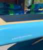 motto for waterkids sup company on the side of youth size touring paddleboard